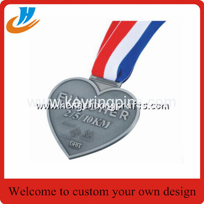 Antique silver engraved running medals, antique silver sports running medals