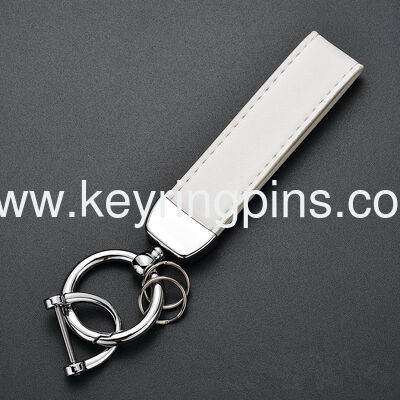 Wholesale PVC Silicone keychains with logo printing，PVC metal keyrings for sale
